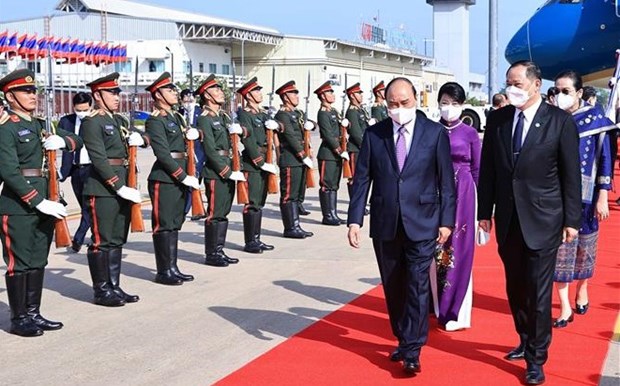 Presidente de Vietnam llega a Vientiane para iniciar visita oficial a Laos hinh anh 1