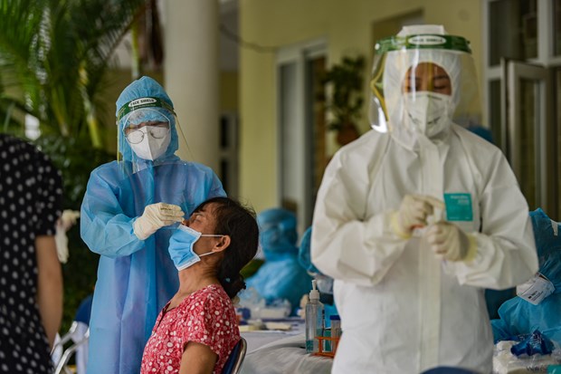 Hanoi realiza pruebas de COVID-19 a 3,3 millones de personas hinh anh 1
