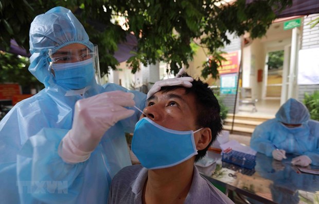 Vietnam reporta leve reduccion de nuevos casos del COVID-19 hinh anh 1
