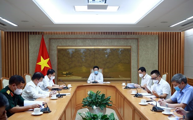 Evaluan en Vietnam resultados de implementacion de la diplomacia de las vacunas hinh anh 1