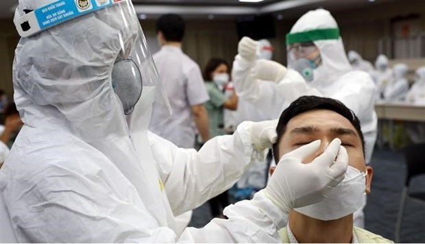 Vietnamitas en el exterior donan 40 mil mascarillas sanitarias a Ciudad Ho Chi Minh hinh anh 1