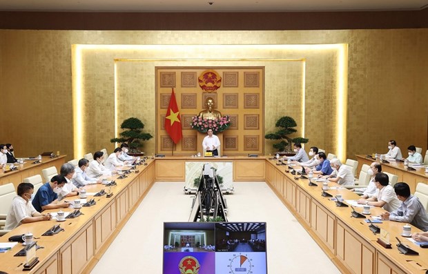 Primer ministro de Vietnam destaca papel de cientificos y medicos en lucha contra el COVID-19 hinh anh 1