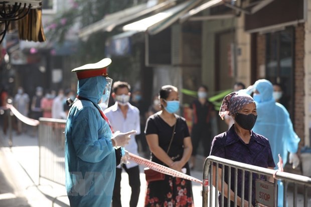 Hanoi detecta 20 nuevos casos positivos del SARS-CoV-2 hinh anh 1