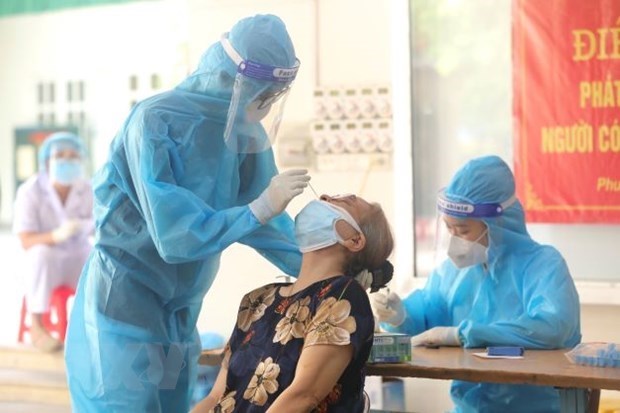 Vietnam reporta mas de 13 mil nuevos casos de COVID-19 hinh anh 1