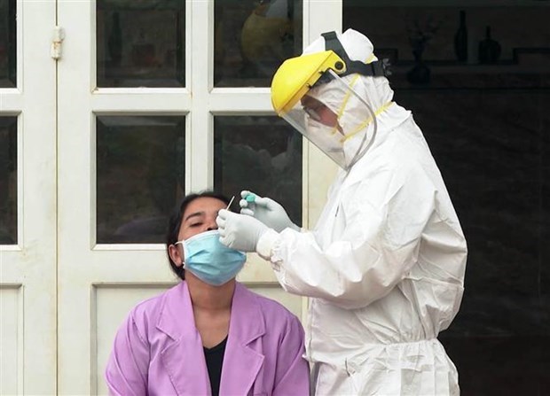 Vietnam registra mas de 12 mil 400 nuevos casos de COVID-19 en las ultimas 24 horas hinh anh 1