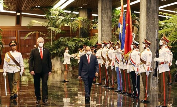 Presidente cubano da la bienvenida a su par vietnamita Nguyen Xuan Phuc hinh anh 1