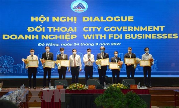 Empresas de IED aportan ideas para restaurar la produccion en ciudad vietnamita de Da Nang hinh anh 1