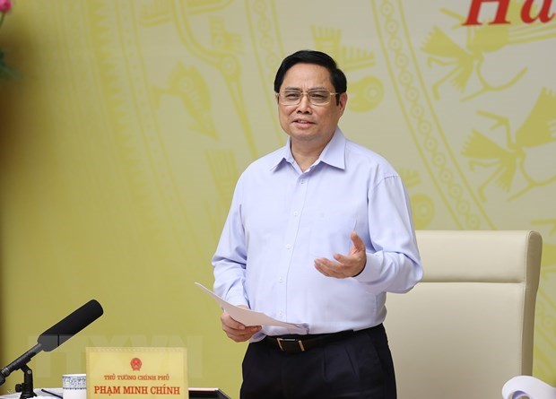 Premier vietnamita preside teleconferencia con las empresas hinh anh 1