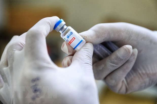 Vietnam aprueba presupuesto adicional para la compra de vacunas COVID-19 hinh anh 1