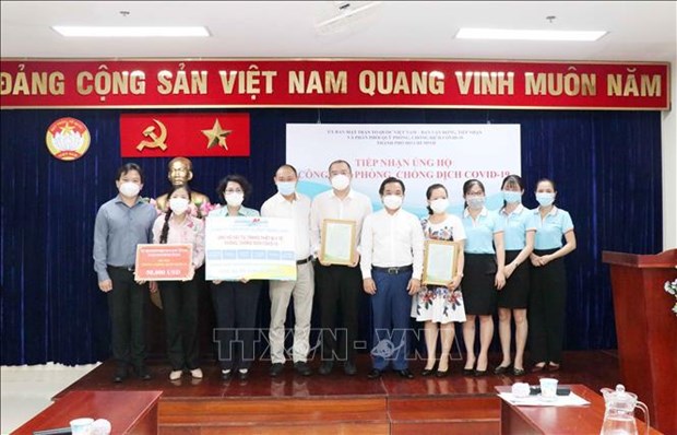 Ciudad Ho Chi Minh continua recibiendo asistencia de empresas en lucha contra el COVID-19 hinh anh 1