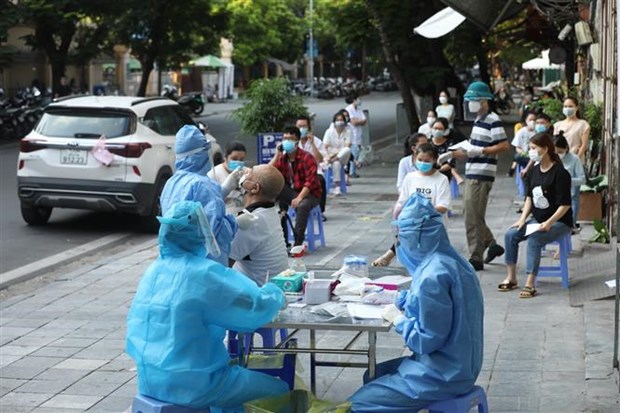 Hanoi reporta cinco casos nuevos del COVID-19 en la comunidad hinh anh 1