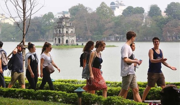 Turistas extranjeros esperan ansiosamente visitar Vietnam hinh anh 2