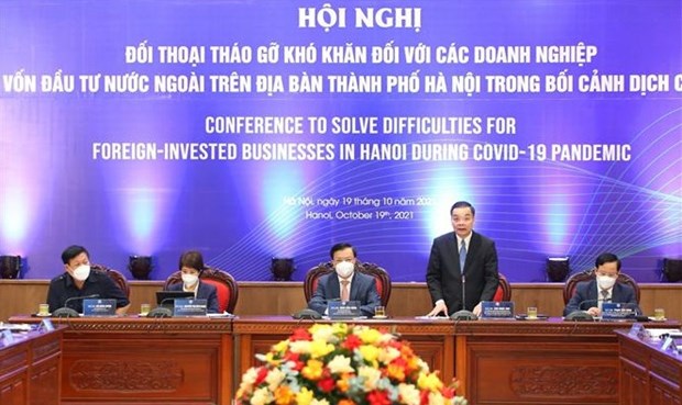 Hanoi se compromete a crear condiciones favorables para inversores extranjeros hinh anh 2