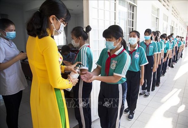 Ciudad Ho Chi Minh emite criterios para la seguridad sobre el COVID-19 en las escuelas hinh anh 2