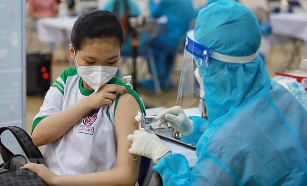 Ciudad Ho Chi Minh inicia vacunacion contra el COVID-19 para alumnos hinh anh 1