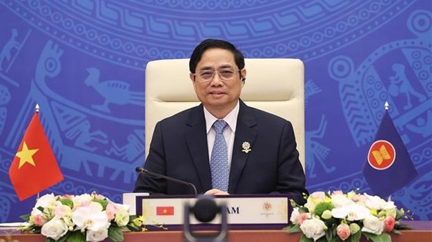 Primer ministro vietnamita solicita a Japon mantener apoyo a la ASEAN hinh anh 1