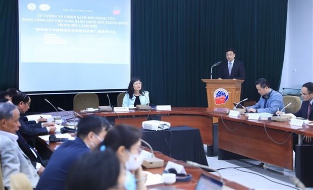 Partidos Comunistas de Vietnam y China intercambian experiencias en politica exterior hinh anh 1