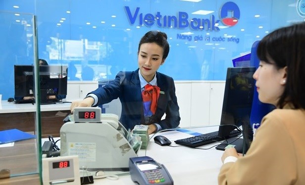 Bancos vietnamitas se apresuran a aumentar capital estatutario hinh anh 1