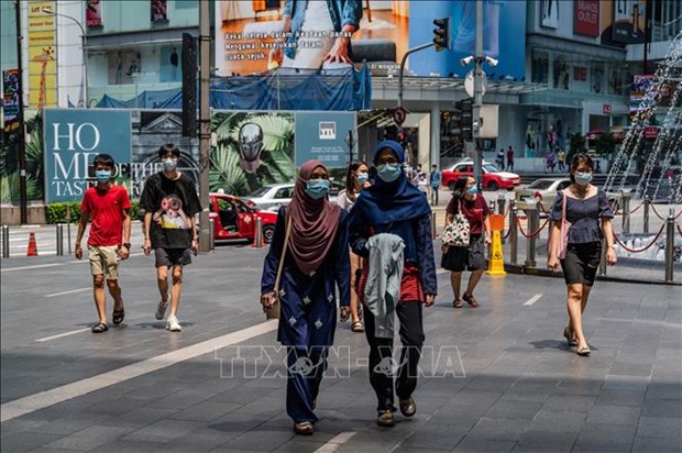 Malasia refuerza control de pandemia del COVID-19 para recuperar economia hinh anh 1