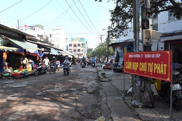 Ciudad Ho Chi Minh considera areas fijas para vendedores ambulantes hinh anh 1
