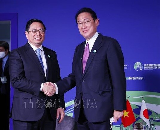 Periodico laosiano resalta significado de visita a Japon del Primer ministro vietnamita hinh anh 1