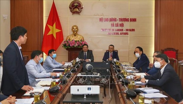 Vietnam intensifica proteger derechos de trabajadores connacionales en extranjero hinh anh 1