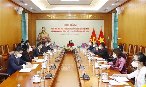 Debaten orientaciones para agilzar cooperacion Vietnam- Laos en movilizacion de masas hinh anh 1