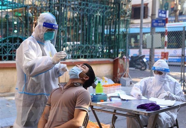 COVID-19: Reduce cifra de infectados nuevos en Vietnam hinh anh 1