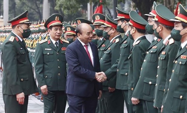 Presidente vietnamita llama a promover investigacion y desarrollo del arte y la cultura militares del pais hinh anh 1