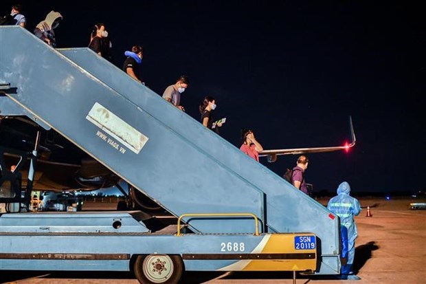 Vietnam Airlines opera primer vuelo internacional regular desde el COVID-19 hinh anh 1