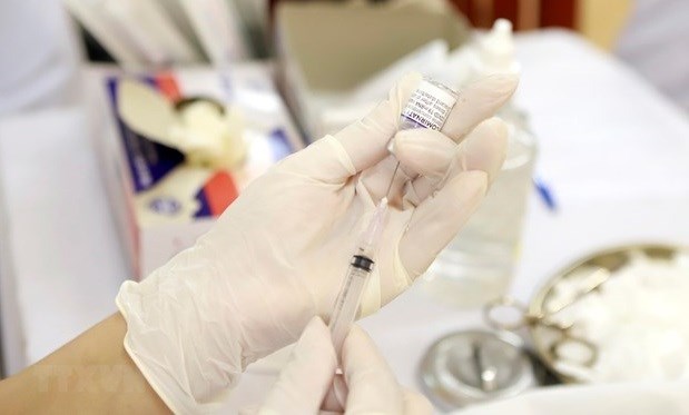 Exigen realizar encuesta sobre vacunacion a ninos mayores de cinco anos en Vietnam hinh anh 1