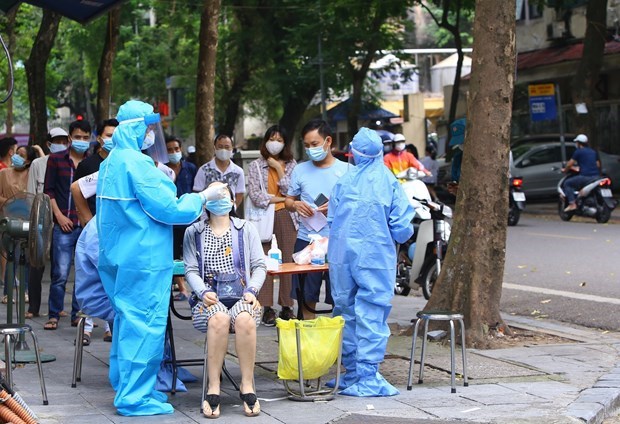Vietnam detecta mas de 16 mil 500 nuevos contagiados del COVID-19 hinh anh 1