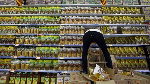 Indonesia establece precio fijo para el aceite de cocina hinh anh 1