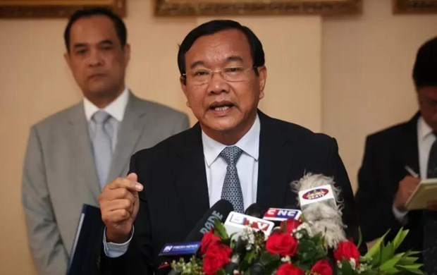 Camboya y Singapur prometen fortalecer unidad de ASEAN hinh anh 1