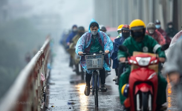 Norte de Vietnam permanece bajo frio intenso y lluvias hinh anh 1
