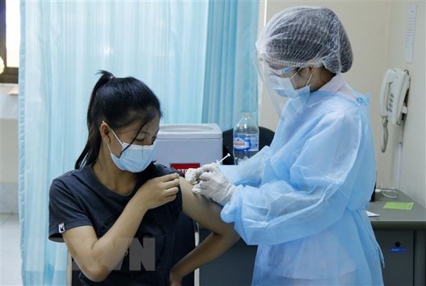 Laos exhorta a la poblacion a vacunarse contra el COVID-19 hinh anh 1