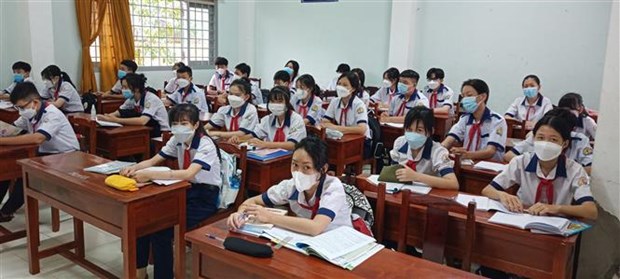 Jardines de infantes y escuelas primarias en Vietnam reabren para recibir a alumnos hinh anh 1