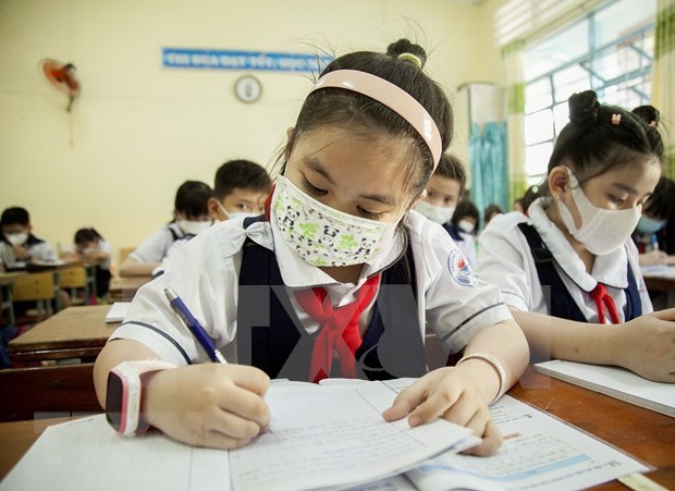 Regreso a escuelas benefica a estudiantes en Vietnam, segun OMS hinh anh 1