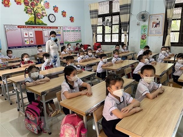 Regreso a escuelas benefica a estudiantes en Vietnam, segun OMS hinh anh 3