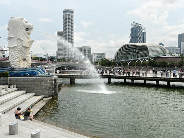 Economia de Singapur registro crecimiento del 7,6 por ciento en 2021 hinh anh 1
