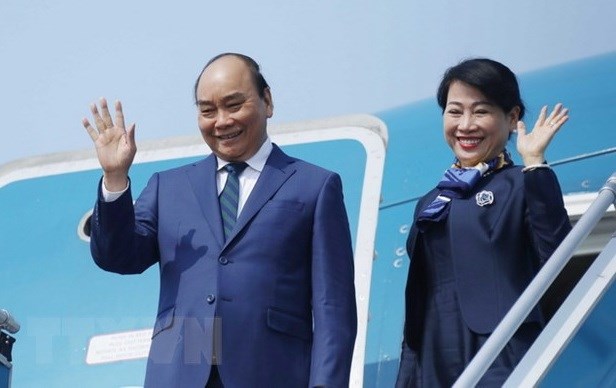 Presidente de Vietnam parte de Hanoi para la visita estatal a Singapur hinh anh 1