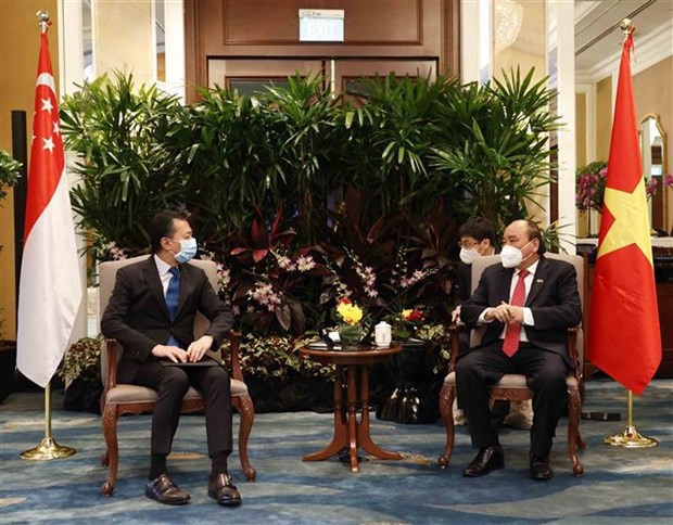 Presidente vietnamita dialoga con empresas lideres singapurenses en finanzas y energias hinh anh 5
