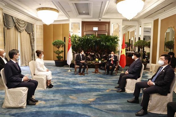 Presidente vietnamita dialoga con empresas lideres singapurenses en finanzas y energias hinh anh 7