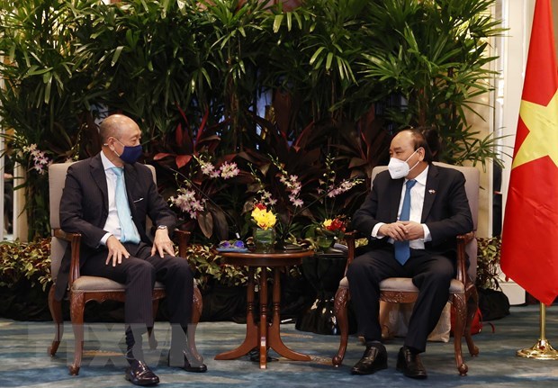 Presidente vietnamita dialoga con empresas lideres singapurenses en finanzas y energias hinh anh 1