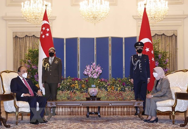 Resaltan exito de la visita del presidente vietnamita a Singapur hinh anh 1
