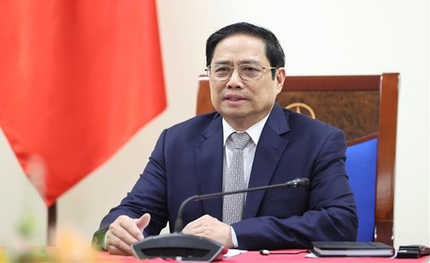 Primer ministro vietnamita dialoga con director general del grupo Adidas hinh anh 1