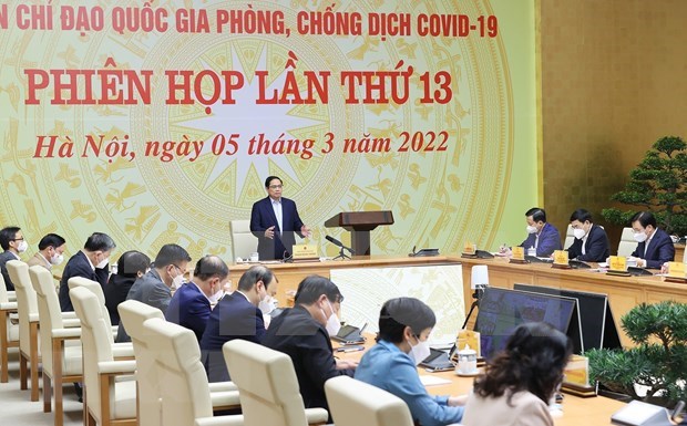 Exigen cumplir multiples tareas para normalizar gradualmente COVID-19 en Vietnam hinh anh 1