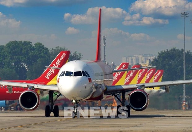 Vietjet Air ofrece servicios gratuitos de pruebas PCR a pasajeros de vuelos internacionales hinh anh 1