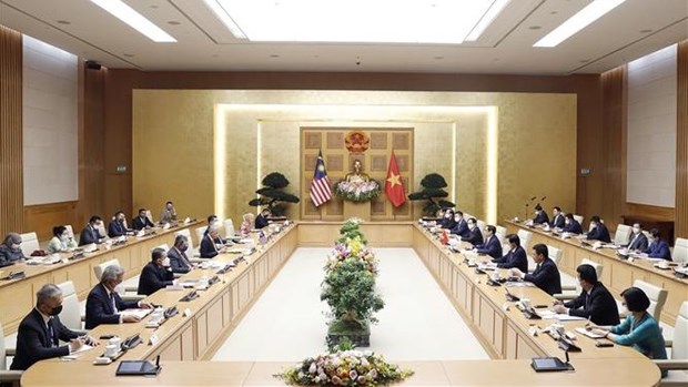 Primer ministro vietnamita se reune con su homologo malasio hinh anh 1