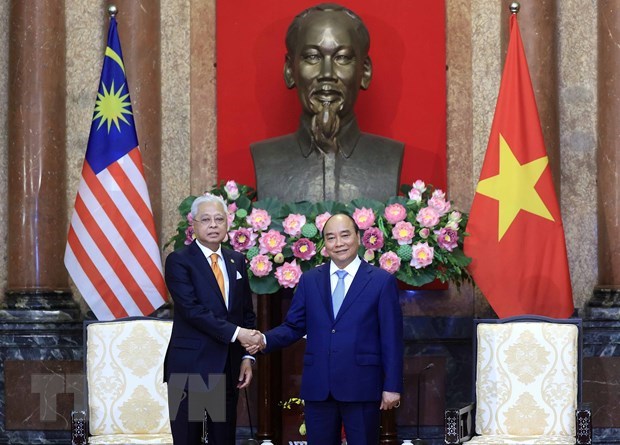 Proponen a Vietnam y Malasia agilizar cumplimiento de tratados comerciales hinh anh 1